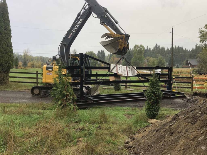 Score_Construction_Revelstoke_135G_installing_custom_driveway_gate_1024