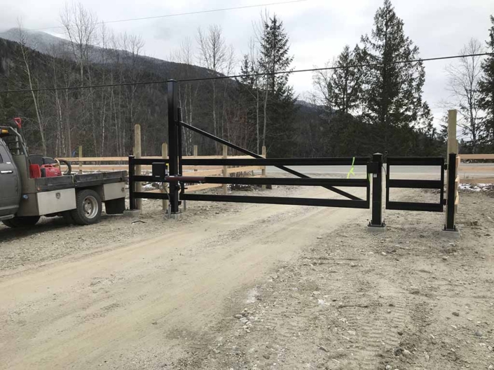 Score_Construction_Revelstoke_Auto_gate_installed_c-w_side_walk_through_gate_1024