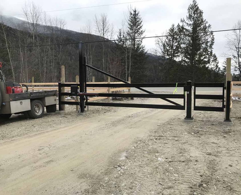 Score_Construction_Revelstoke_Auto_gate_installed_c-w_side_walk_through_gate_1024