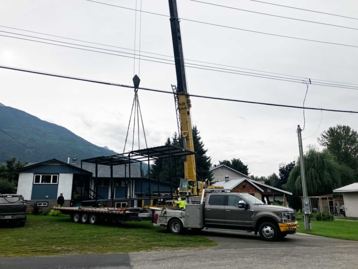 30ft RV Storage structure crane installation to back yard of residential home 30ft RV Storage structure crane installation to back yard of residential home