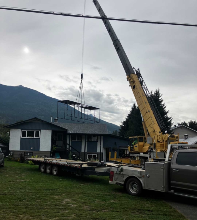 30ft RV Storage structure crane installation to back yard of residential home 30ft RV Storage structure crane installation to back yard of residential home