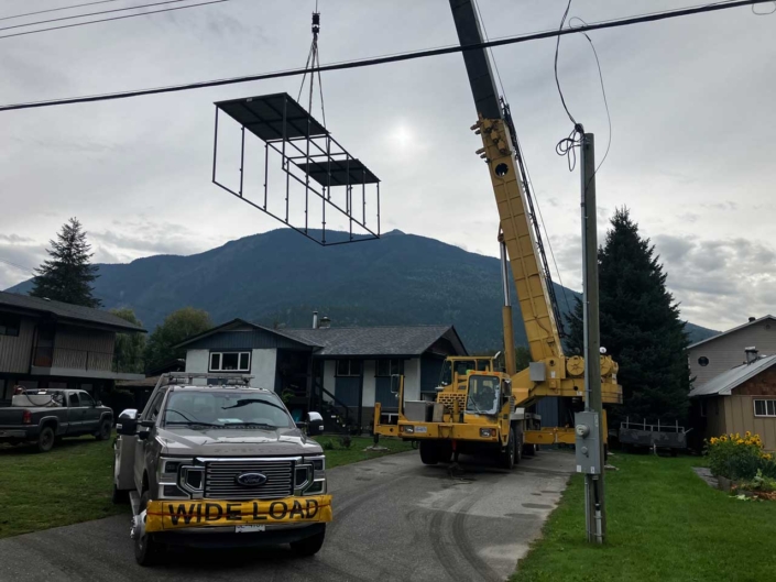 30ft RV Storage structure crane installation to back yard of residential home 30ft RV Storage structure crane installation to back yard of residential home